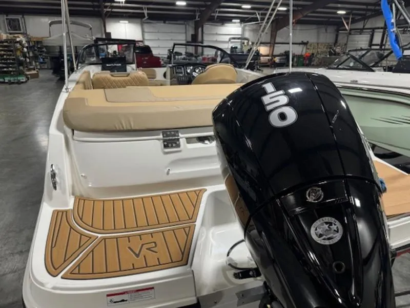 Slide: The Image of 2024 Bayliner VR5 Bowrider Outboard with 150 HP engine in showroom. - 9