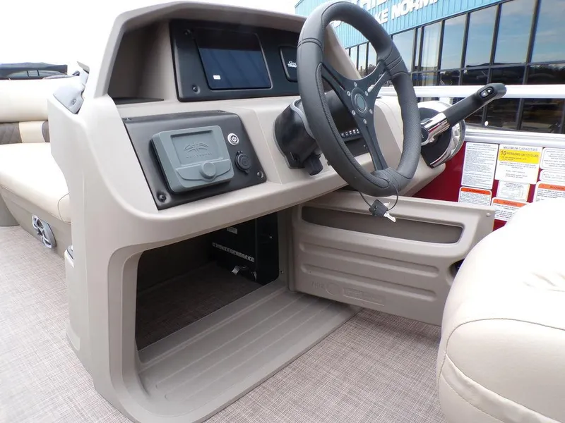Slide: The Image of 2024 Sun Tracker PARTY BARGE® 20 DLX steering console and dashboard. - 16