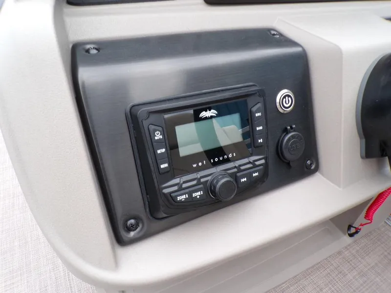 Slide: The Image of 2024 Sun Tracker PARTY BARGE® 20 DLX audio control panel. - 18