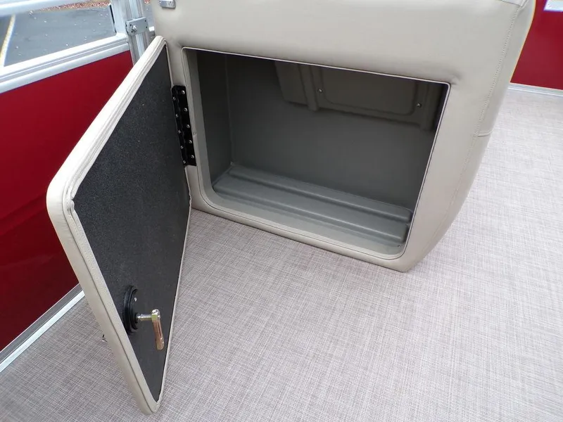 Slide: The Image of Open storage compartment on 2024 Sun Tracker PARTY BARGE® 20 DLX pontoon boat. - 26