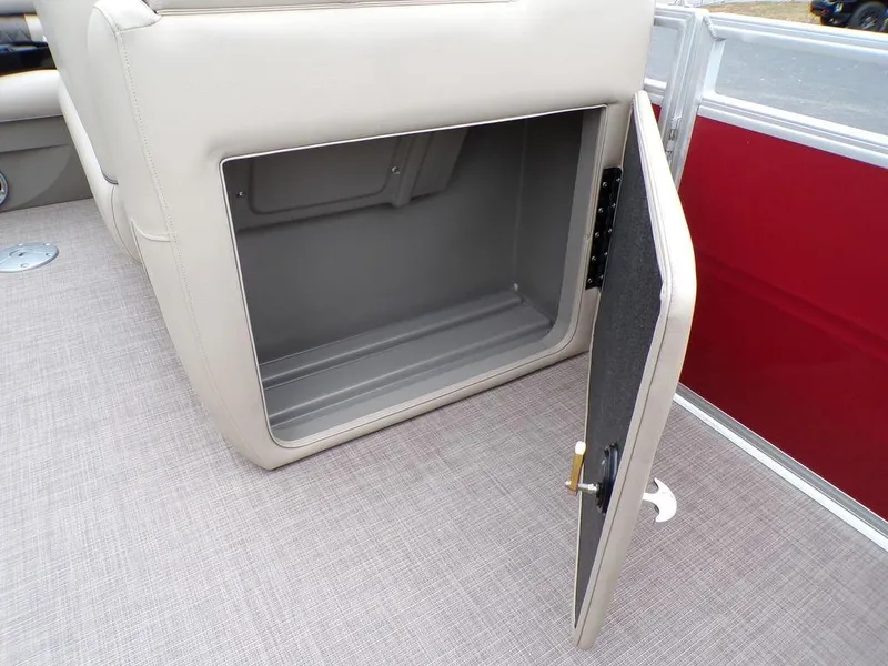 Slide: The Image of Open storage compartment on 2024 Sun Tracker PARTY BARGE® 20 DLX pontoon boat. - 27