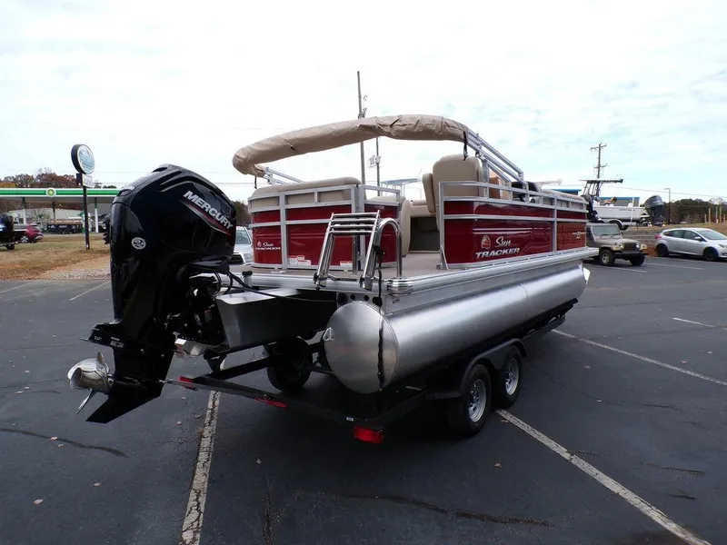Slide: The Image of 2024 Sun Tracker PARTY BARGE® 20 DLX pontoon boat with Mercury outboard motor. - 8