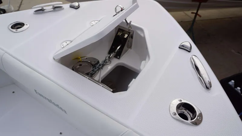 Slide: The Image of 2024 Everglades 273 CC boat anchor locker with stainless steel hardware. - 16