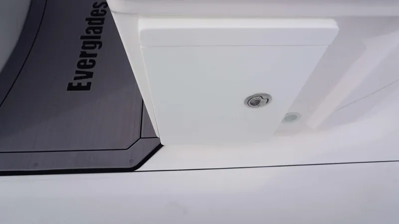 Slide: The Image of Close-up of 2024 Everglades 273 CC boat storage compartment and deck. - 9