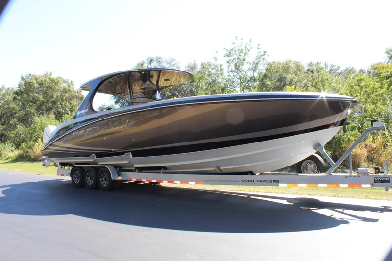 Slide: The Image of 2016 Mystic Powerboats M4200 on a trailer, side view. - 11