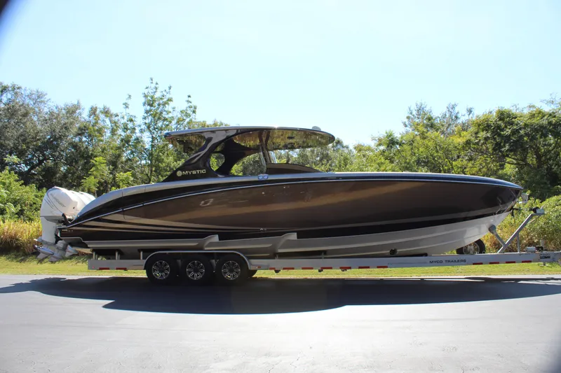 Slide: The Image of 2016 Mystic Powerboats M4200 on trailer, side view. - 12