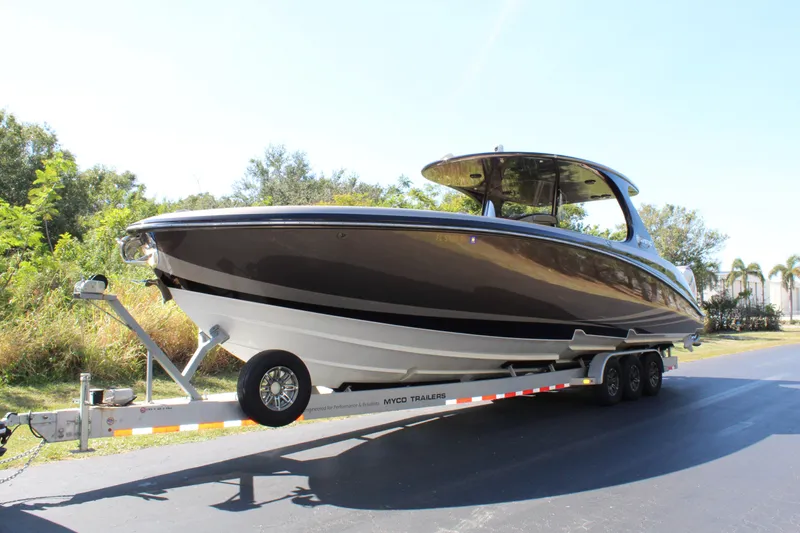 Slide: The Image of 2016 Mystic Powerboats M4200 on a trailer, side view. - 2