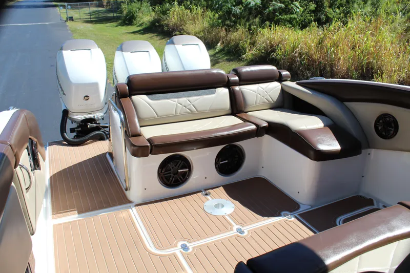 Slide: The Image of 2016 Mystic Powerboats M4200 interior seating and outboard engines. - 26
