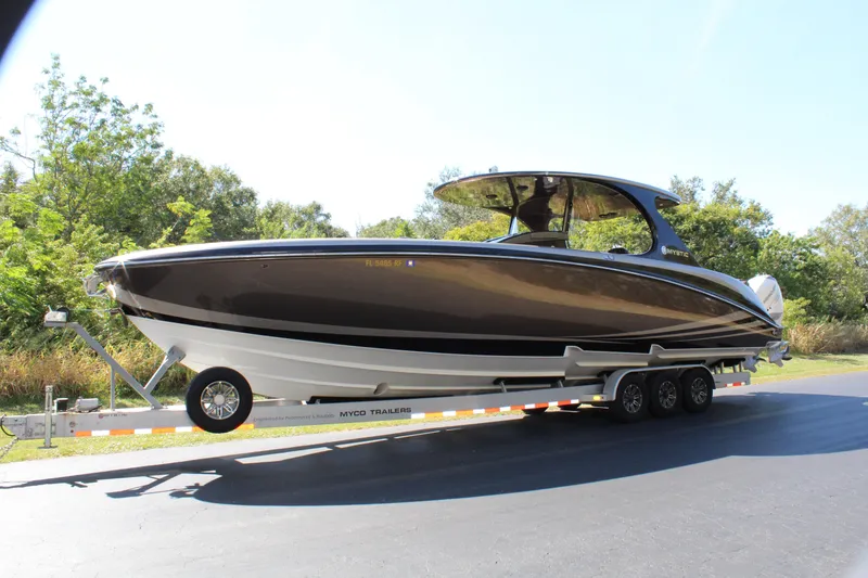 Slide: The Image of 2016 Mystic Powerboats M4200 on a trailer, side view. - 3