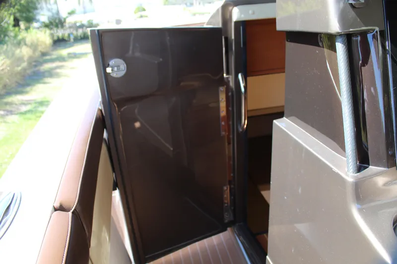 Slide: The Image of 2016 Mystic Powerboats M4200 cabin door open, revealing interior. - 36