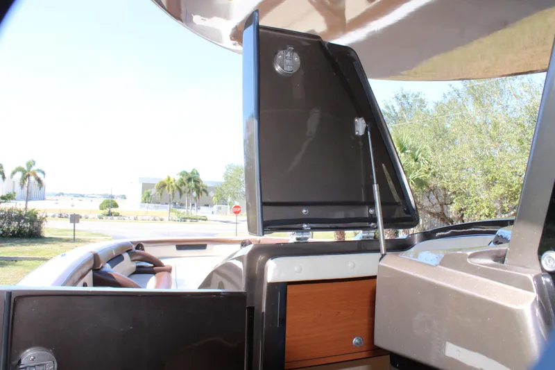 Slide: The Image of 2016 Mystic Powerboats M4200 interior with open storage compartments. - 38