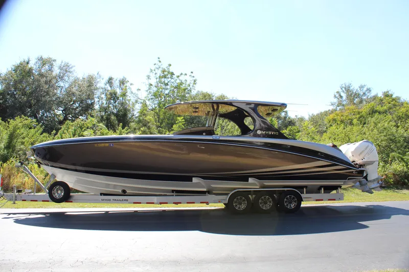Slide: The Image of 2016 Mystic Powerboats M4200 on trailer, side view. - 5