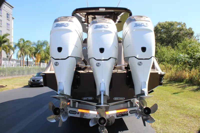 Slide: The Image of 2016 Mystic Powerboats M4200 with triple 350 horsepower engines. - 9