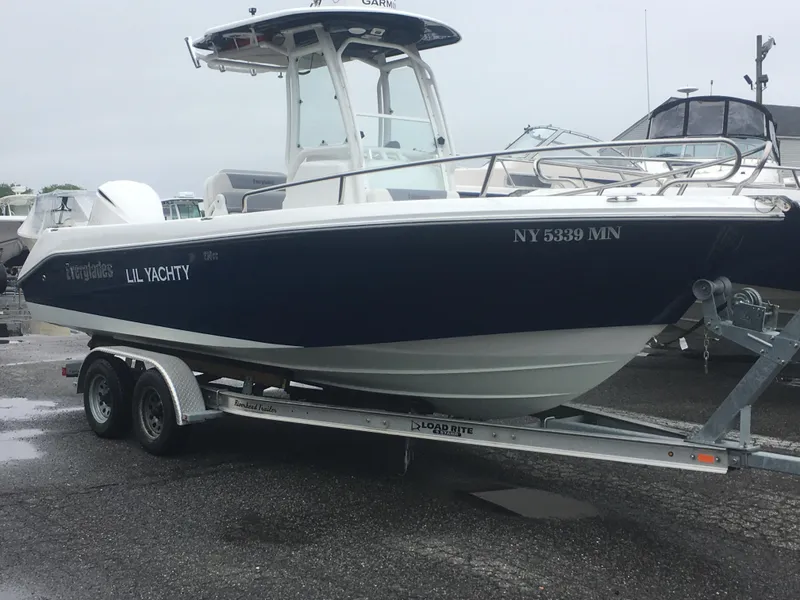 The Image of 2018 Everglades 230CC boat on trailer, side view. - 0