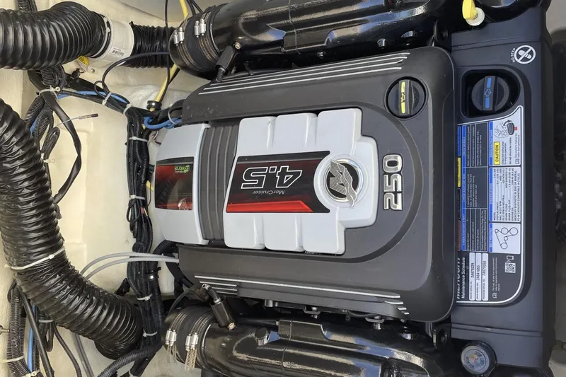 Slide: The Image of 2020 Bayliner VR6 Bowrider I/O engine compartment with a 250 HP MerCruiser 4.5L engine. - 7