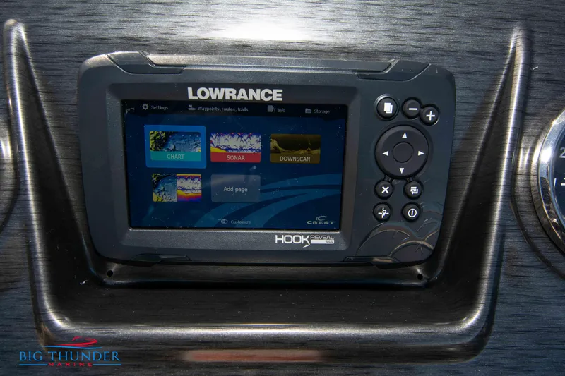 Slide: The Image of Lowrance fish finder on 2024 Crest Classic DLX 240 SLC boat dashboard. - 27