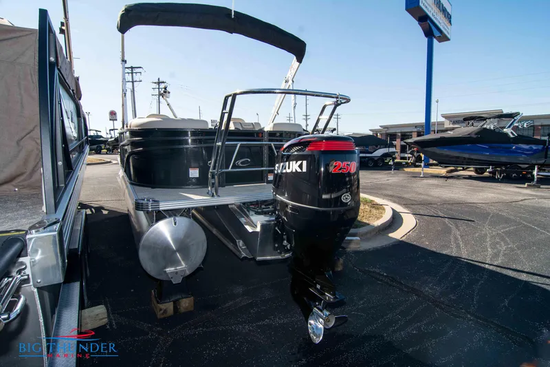 Slide: The Image of 2024 Crest Classic DLX 240 SLC pontoon boat with Suzuki 250 outboard motor. - 4