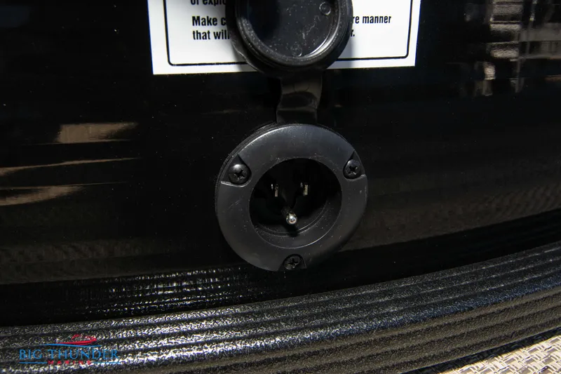 Slide: The Image of Close-up of a 2024 Crest Classic DLX 240 SLC boat's electrical outlet. - 40