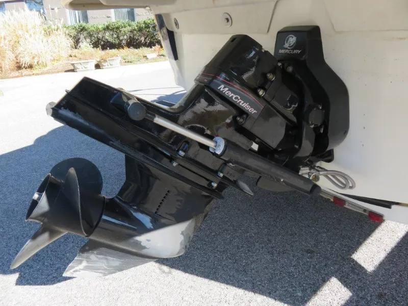 Slide: The Image of 2008 Sea Ray 195 Sport boat with MerCruiser engine and propeller. - 11