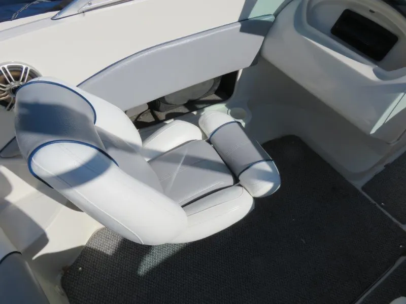 Slide: The Image of 2008 Sea Ray 195 Sport boat interior with white and gray seating. - 5
