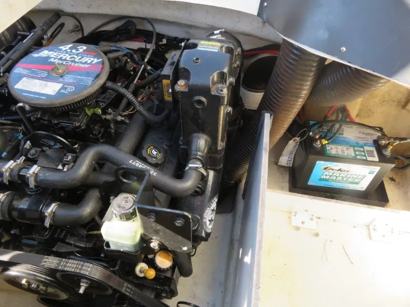 Slide: The Image of Engine compartment of a 2008 Sea Ray 195 Sport with Mercury MerCruiser and marine battery. - 9