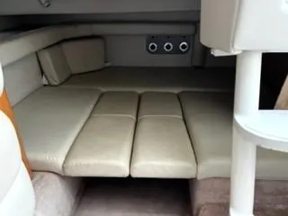 Slide: The Image of Interior cabin of 2001 Regal 2960 Commodore Cruiser with beige seating. - 12