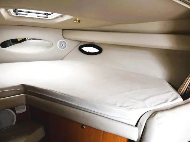 Slide: The Image of 2001 Regal 2960 Commodore Cruiser cabin interior with bed and porthole. - 16