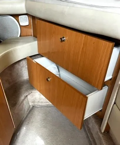 Slide: The Image of Interior storage drawers of 2001 Regal 2960 Commodore Cruiser boat. - 17
