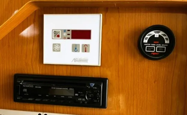 Slide: The Image of Control panel and gauges on a 2001 Regal 2960 Commodore Cruiser. - 22