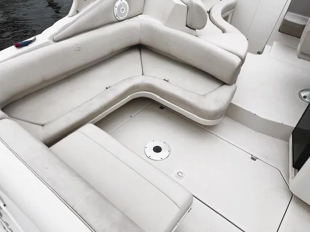 Slide: The Image of 2001 Regal 2960 Commodore Cruiser interior with white seating and speaker. - 45