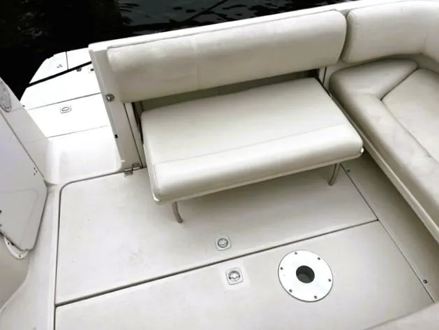 Slide: The Image of 2001 Regal 2960 Commodore Cruiser interior with white seating and deck. - 46
