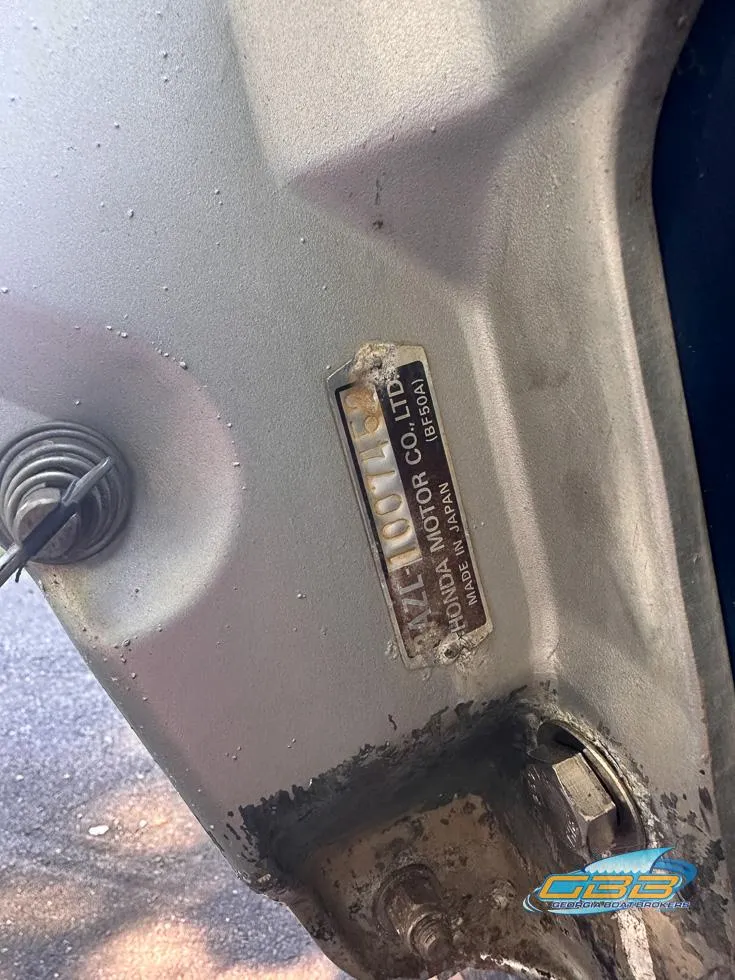 Slide: The Image of Close-up of a 2015 Polar Kraft Outlander 186 SC boat motor. - 18