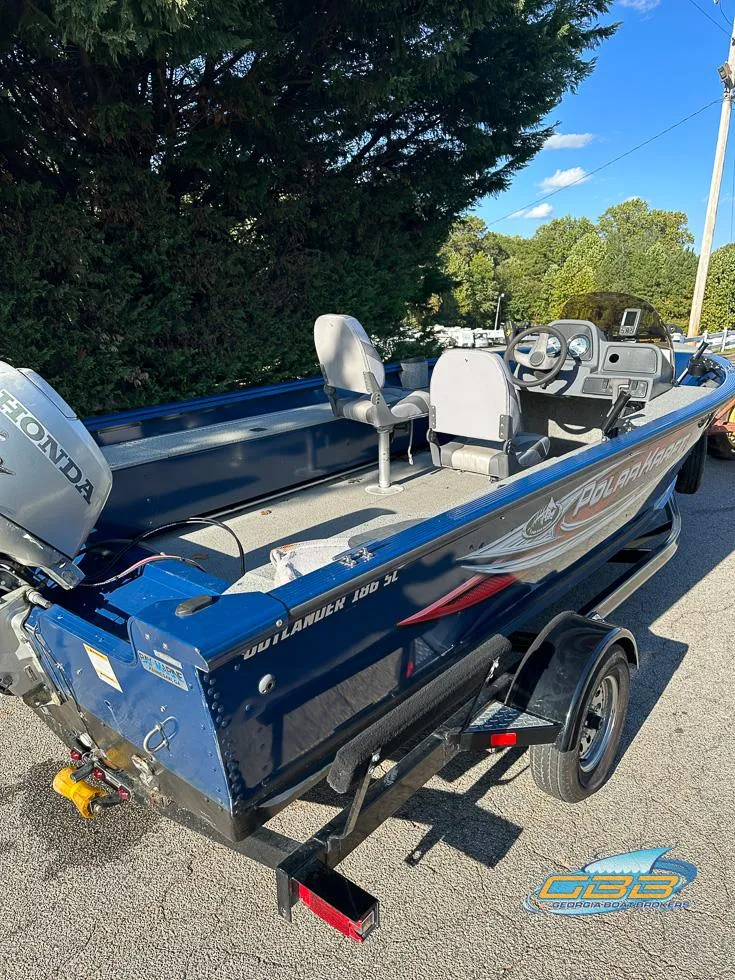 Slide: The Image of 2015 Polar Kraft Outlander 186 SC fishing boat with Honda outboard motor. - 5