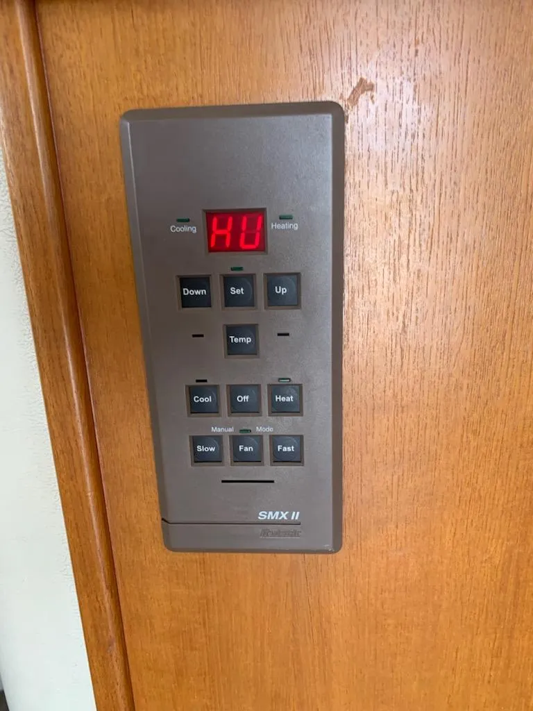 Slide: The Image of 2000 Riviera 34 Convertible SMX II climate control panel - 18