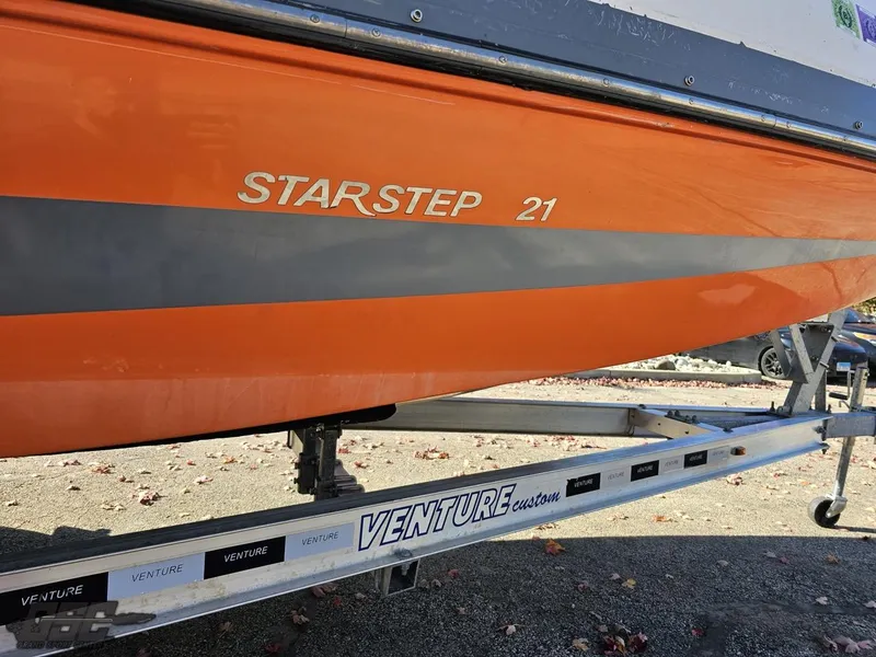 Slide: The Image of 2018 Starcraft Star Step 221 I/O boat on Venture trailer. - 21