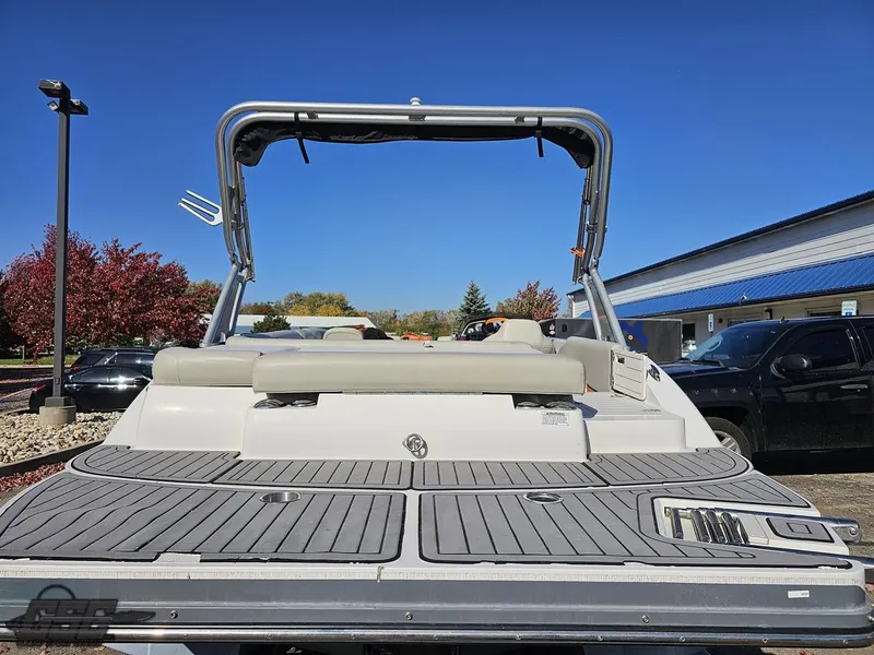 Slide: The Image of 2018 Starcraft Star Step 221 I/O boat, rear view, docked outdoors. - 27