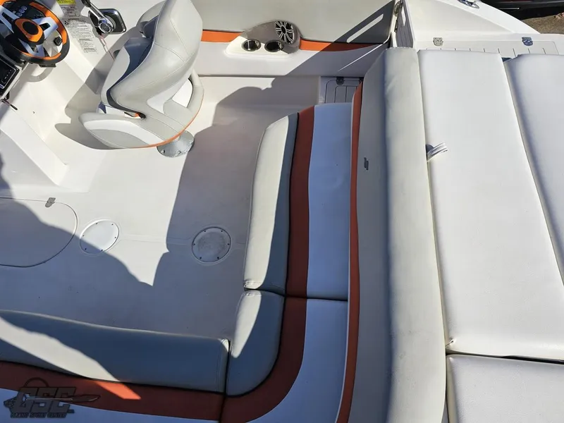 Slide: The Image of 2018 Starcraft Star Step 221 I/O boat interior with white and orange seating. - 33