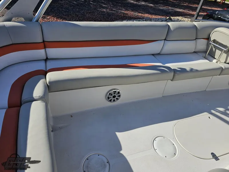 Slide: The Image of 2018 Starcraft Star Step 221 I/O boat interior with cushioned seating and speaker. - 37