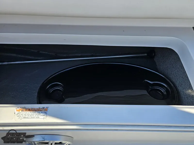 Slide: The Image of 2018 Starcraft Star Step 221 I/O storage compartment with warning label. - 38