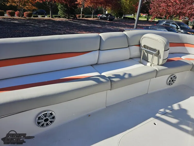 Slide: The Image of 2018 Starcraft Star Step 221 I/O boat interior with cushioned seating and built-in speakers. - 42
