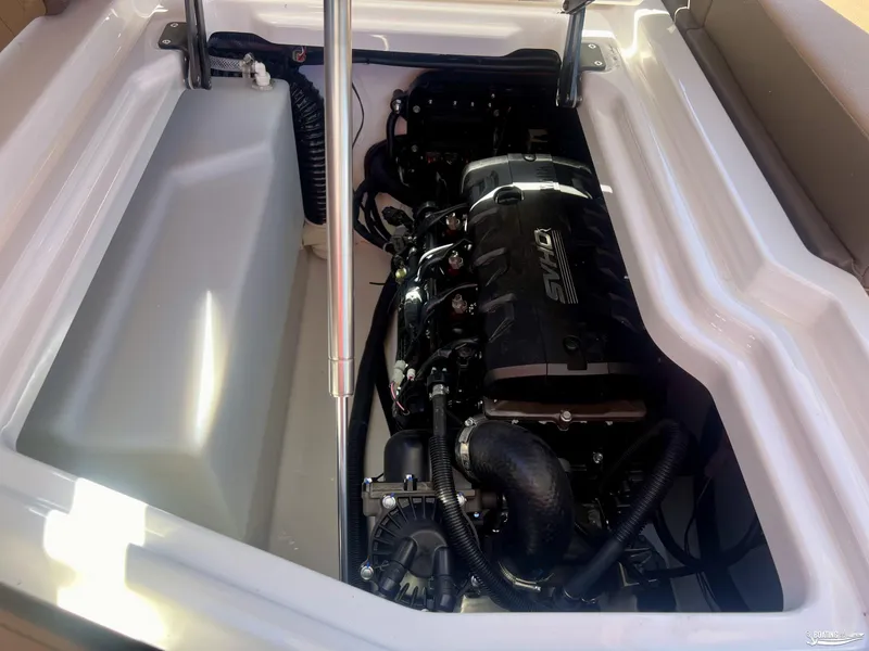 Slide: The Image of 2025 Yamaha Boats 275SD engine compartment with visible components and storage area. - 10