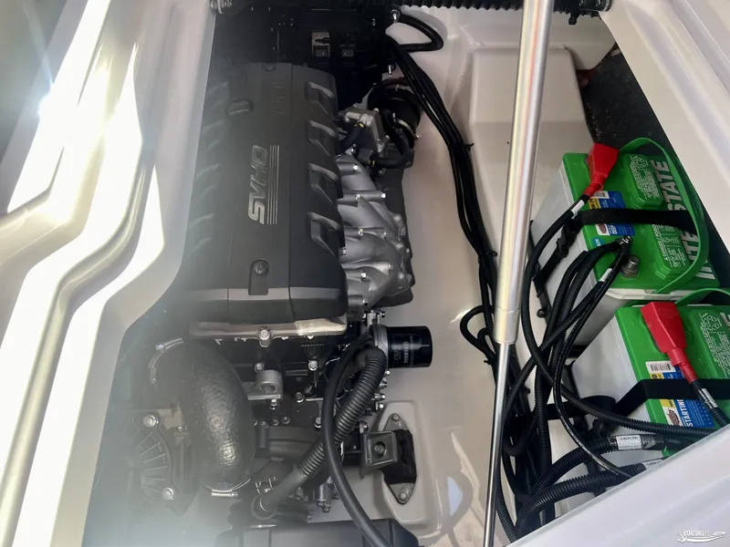 Slide: The Image of 2025 Yamaha Boats 275SD engine compartment with batteries and wiring. - 9
