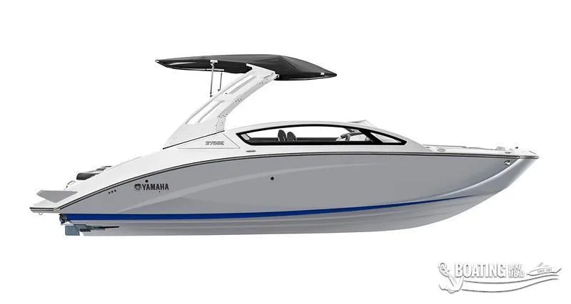 Slide: The Image of 2024 Yamaha Boats 275 SE, sleek white design, side view. - 16