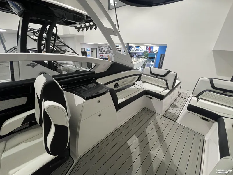 Slide: The Image of 2024 Yamaha Boats 275 SE interior with sleek seating and modern design. - 6