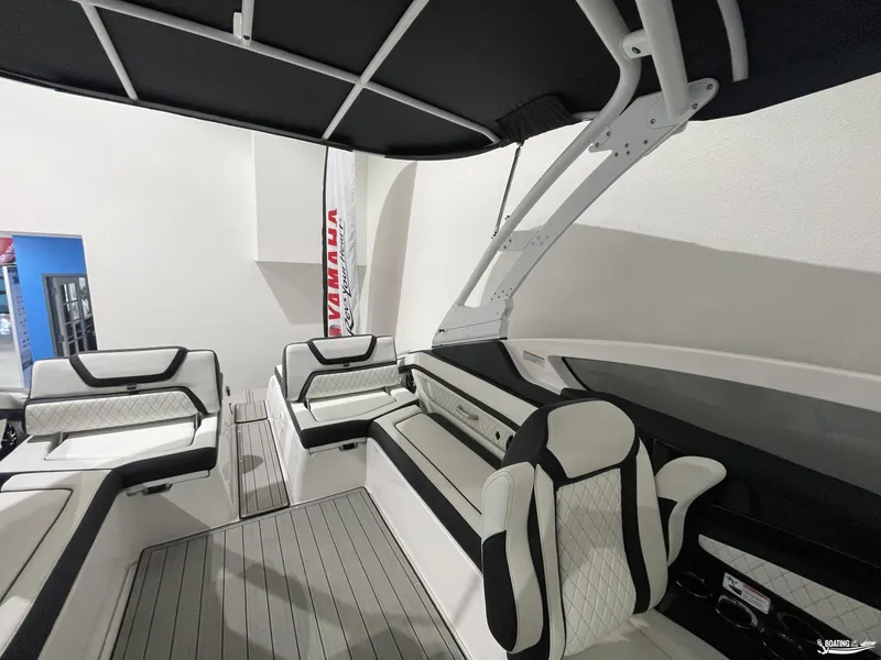 Slide: The Image of 2024 Yamaha Boats 275 SE interior with sleek seating and modern design. - 7
