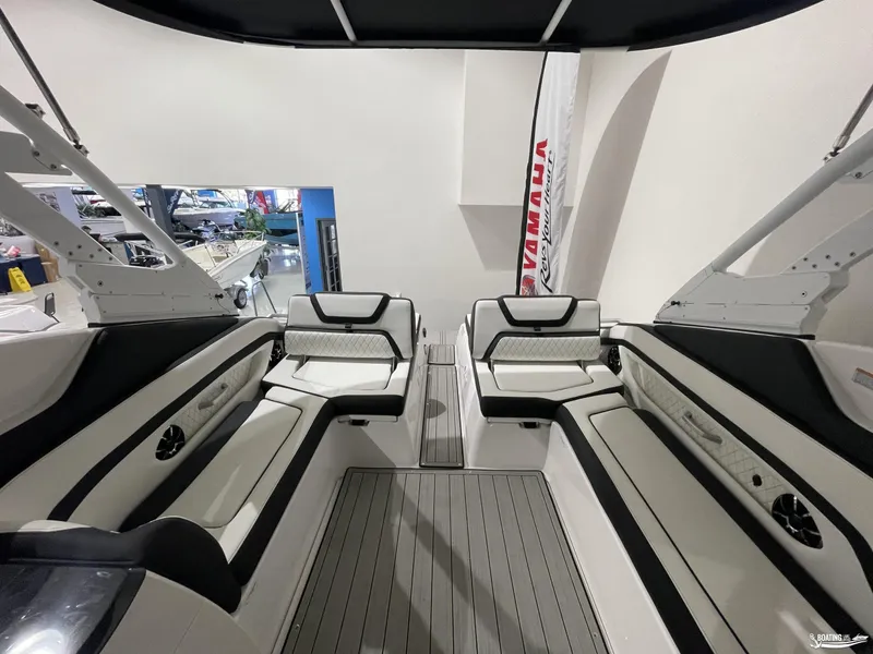 Slide: The Image of 2024 Yamaha Boats 275 SE interior with sleek seating and modern design. - 9