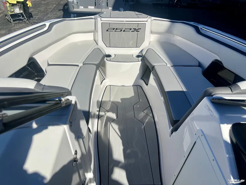 Slide: The Image of 2025 Yamaha Boats 252 XE interior with sleek seating and modern design. - 5