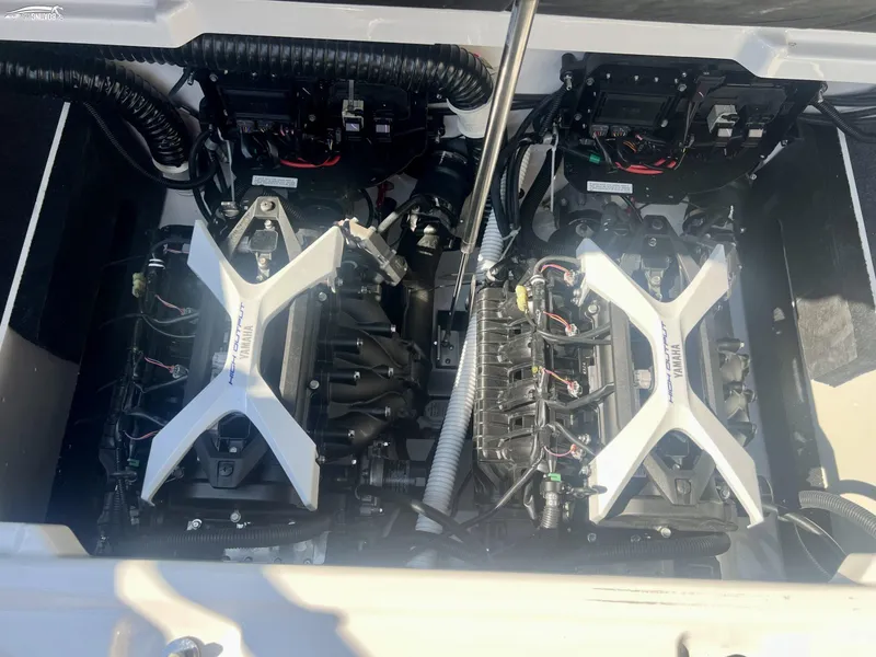 Slide: The Image of 2025 Yamaha Boats 222SE engine compartment with twin high-output engines. - 5