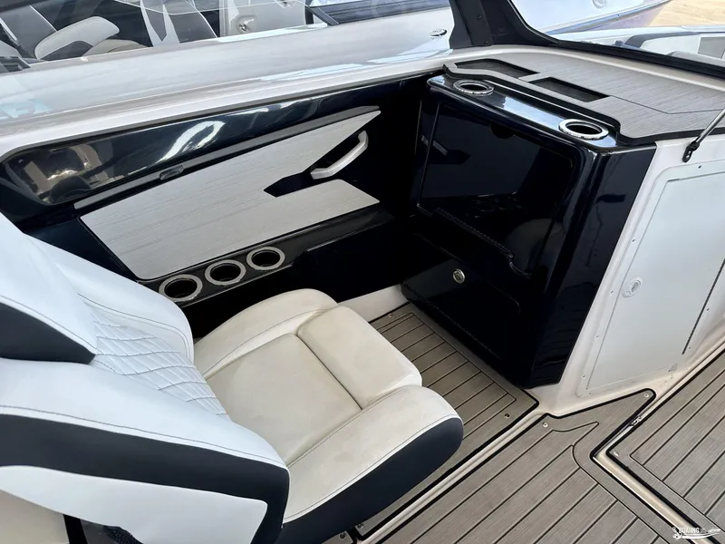 Slide: The Image of 2025 Yamaha Boats 222SE interior with sleek seating and modern design. - 6