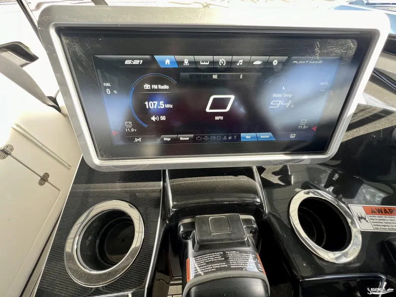 Slide: The Image of 2024 Yamaha Boats 252 SD dashboard with digital display and controls. - 8